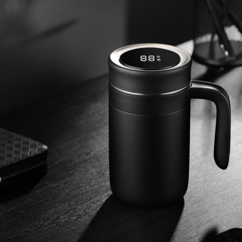 black mug on black desk