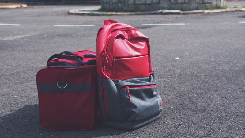 red gray duffel bag and backpack for going to the gym